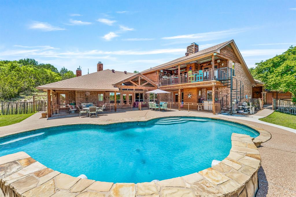 475 Magic Valley Bluff Dale, TX 76433 - Photo 33 of 40 a view of a house with swimming pool and sitting area