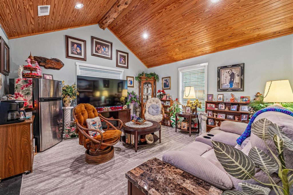 475 Magic Valley Bluff Dale, TX 76433 - Photo 35 of 40 a living room filled with furniture or couch and a fireplace