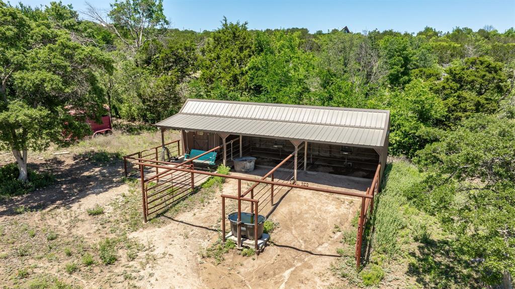 475 Magic Valley Bluff Dale, TX 76433 - Photo 39 of 40 a view of a house with backyard and sitting area