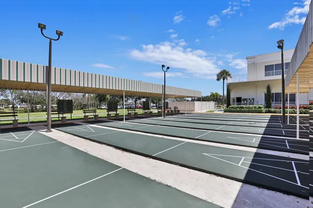 a view of a floor to ceiling window with pool table