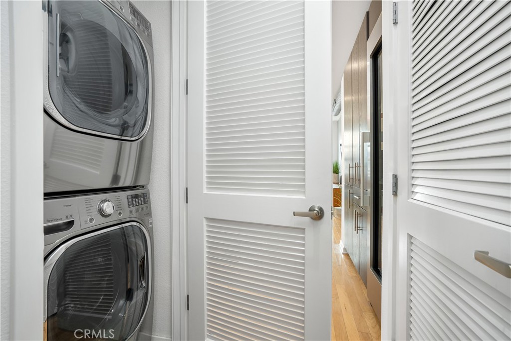 133 The Promenade North, Unit 422 Long Beach, CA 90802 - Photo 12 of 52 a view of a bathroom with washing machine
