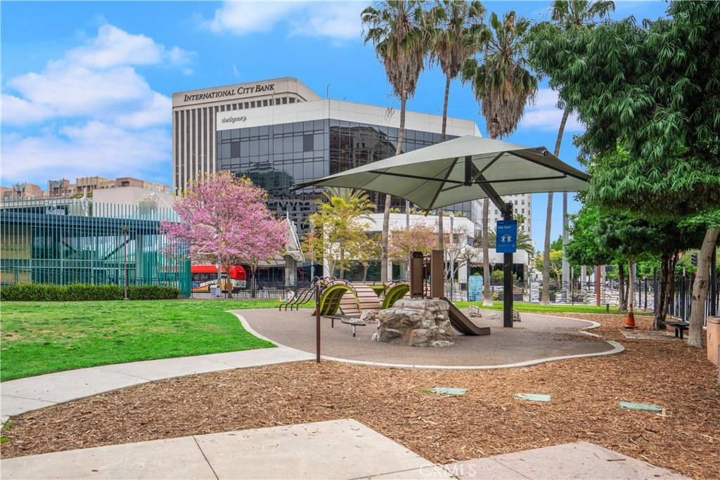 133 The Promenade North, Unit 422 Long Beach, CA 90802 - Photo 35 of 52 a childrens park with lots of swings and slides