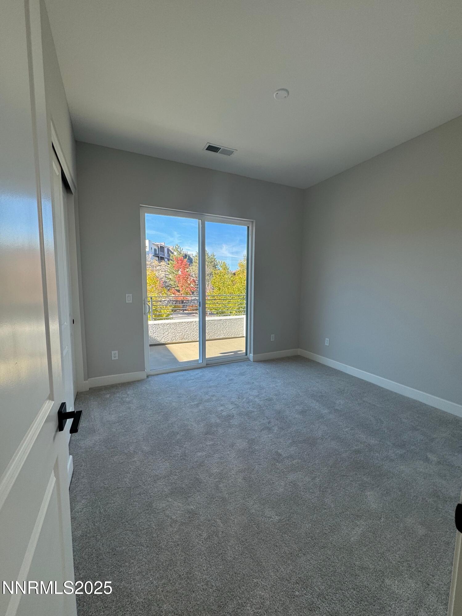 1521 Golf Club Drive Reno, NV 89519 - Photo 28 of 38 a view of an empty room with a window