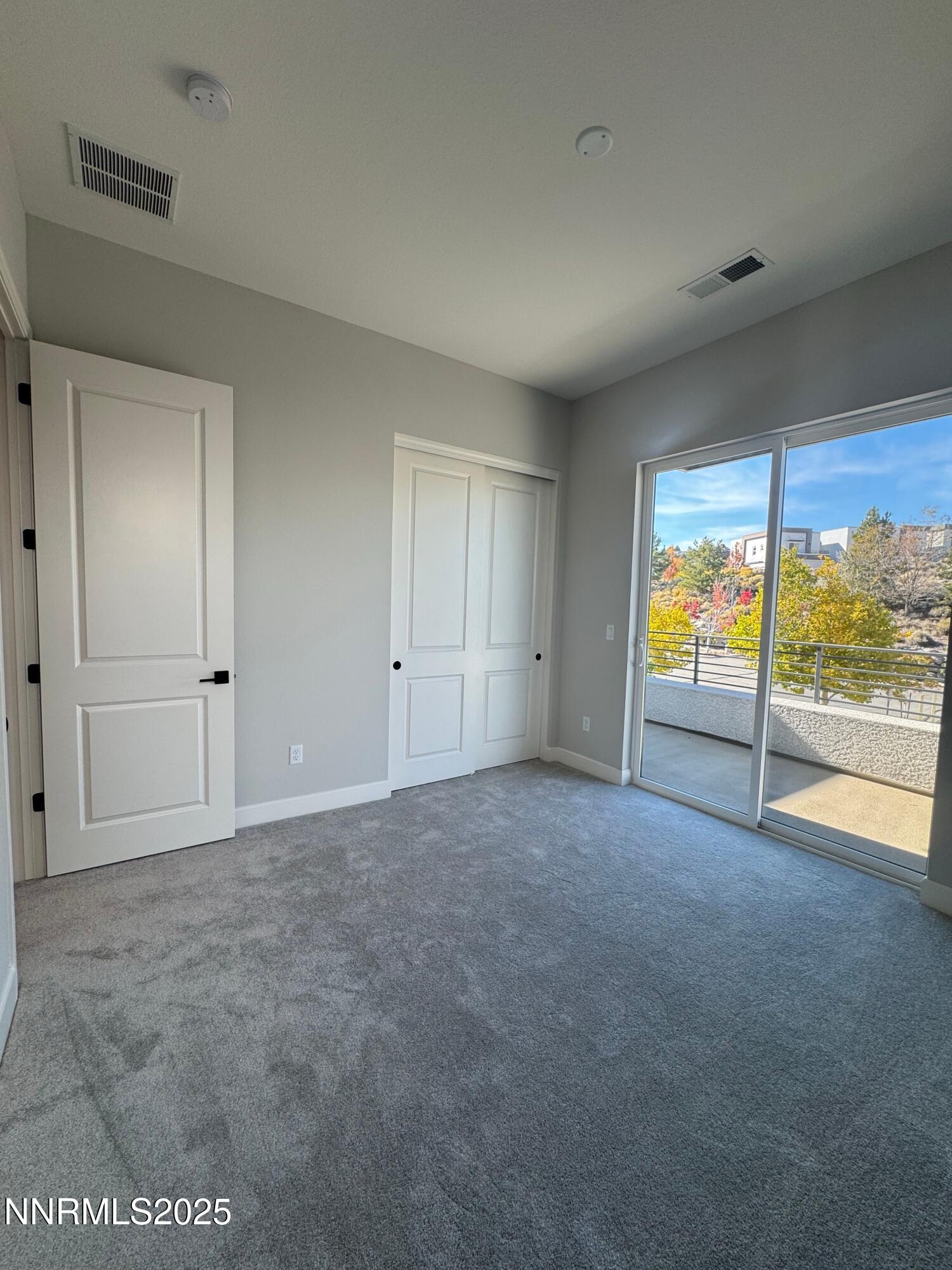 1521 Golf Club Drive Reno, NV 89519 - Photo 29 of 38 a view of an empty room with a window