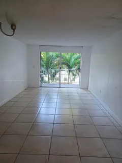 a view of a livingroom with a staircase
