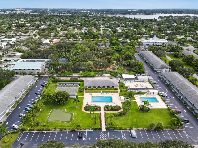 an aerial view of a pool patio swimming pool and outdoor seating