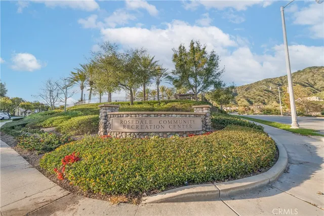 a view of a back yard of the house and front view of a house
