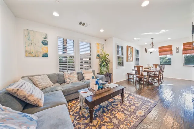 a living room with furniture and a table