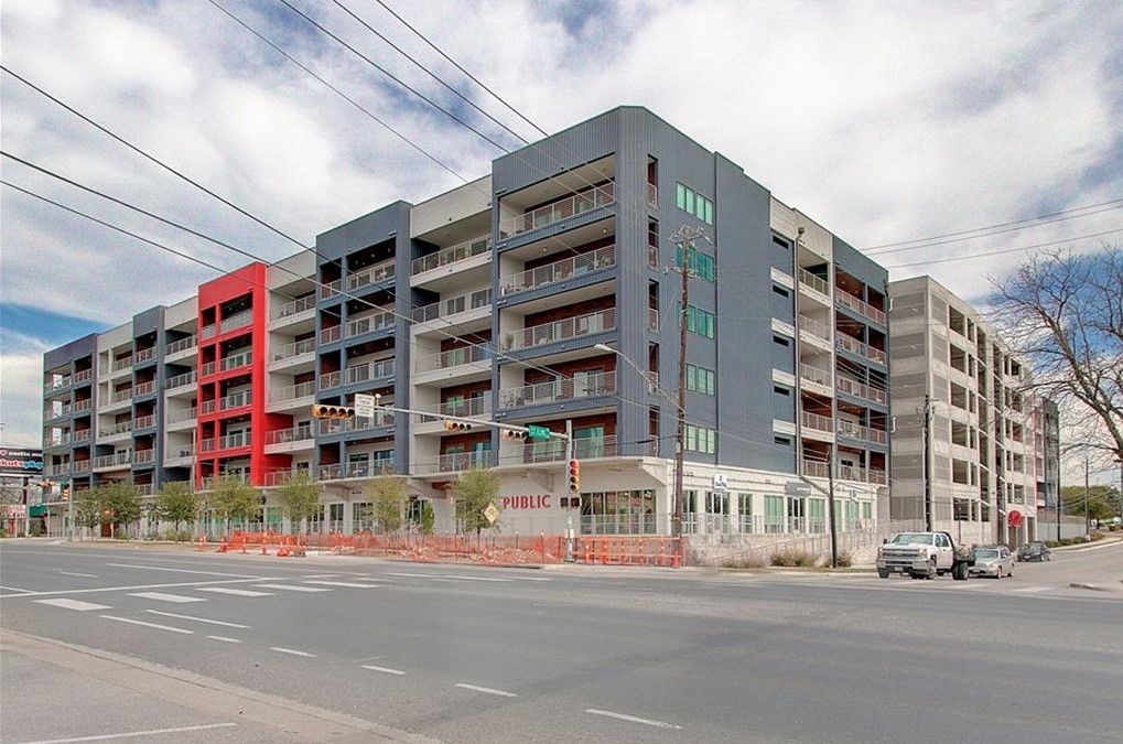 4361 South Congress Avenue, Unit 210 Austin, TX 78745 - Photo 22 of 30 a front view of multi story residential apartment building
