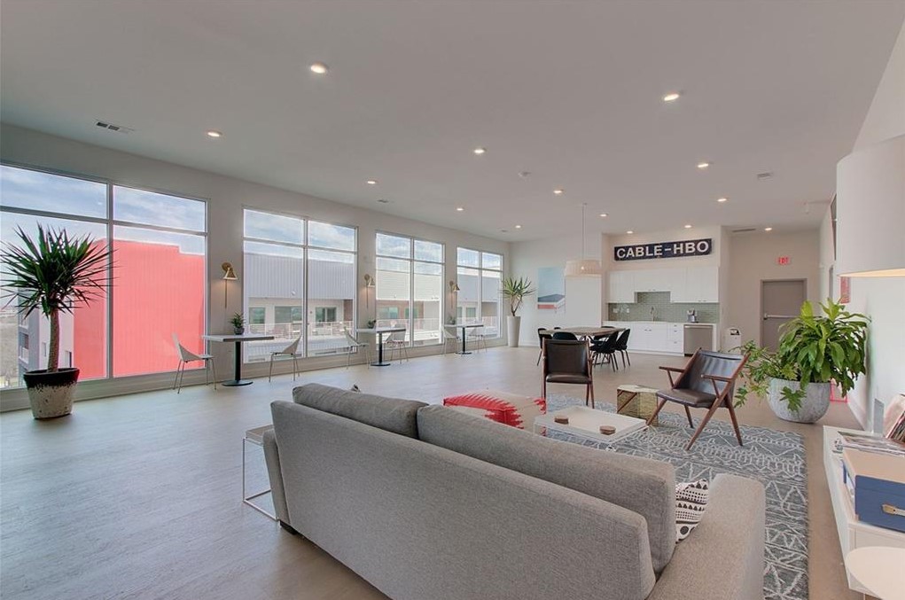 4361 South Congress Avenue, Unit 210 Austin, TX 78745 - Photo 27 of 30 a living room with furniture and a large window