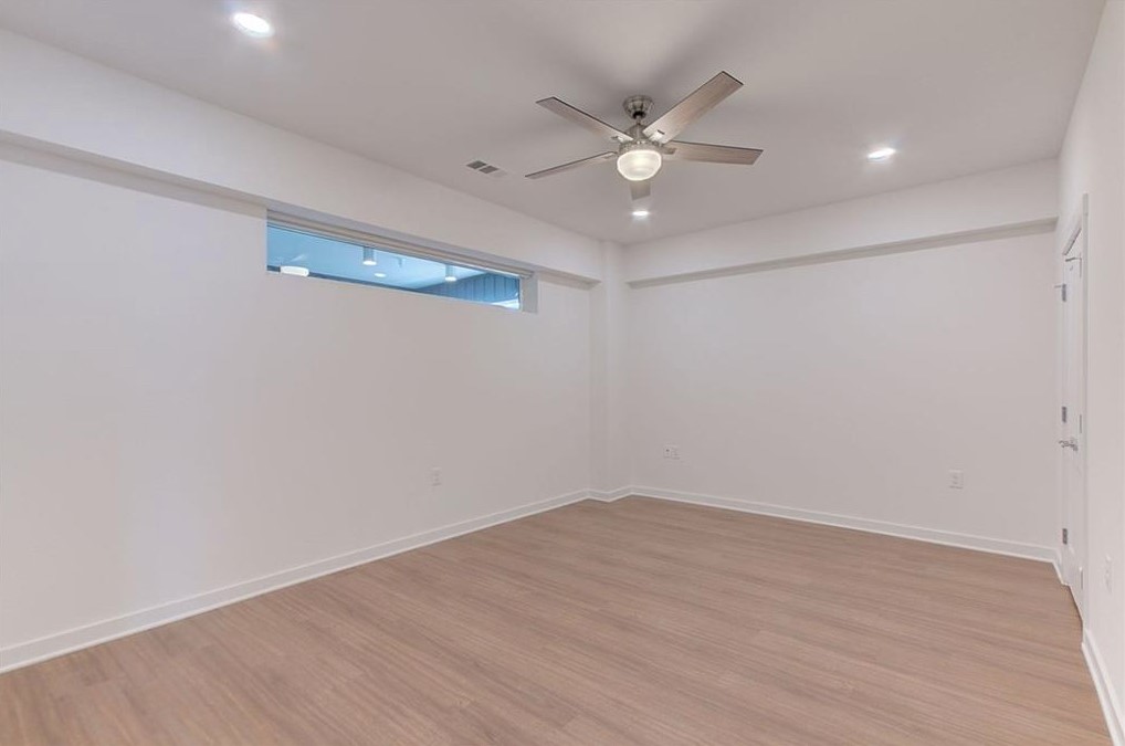 4361 South Congress Avenue, Unit 210 Austin, TX 78745 - Photo 8 of 30 wooden floor in an empty room