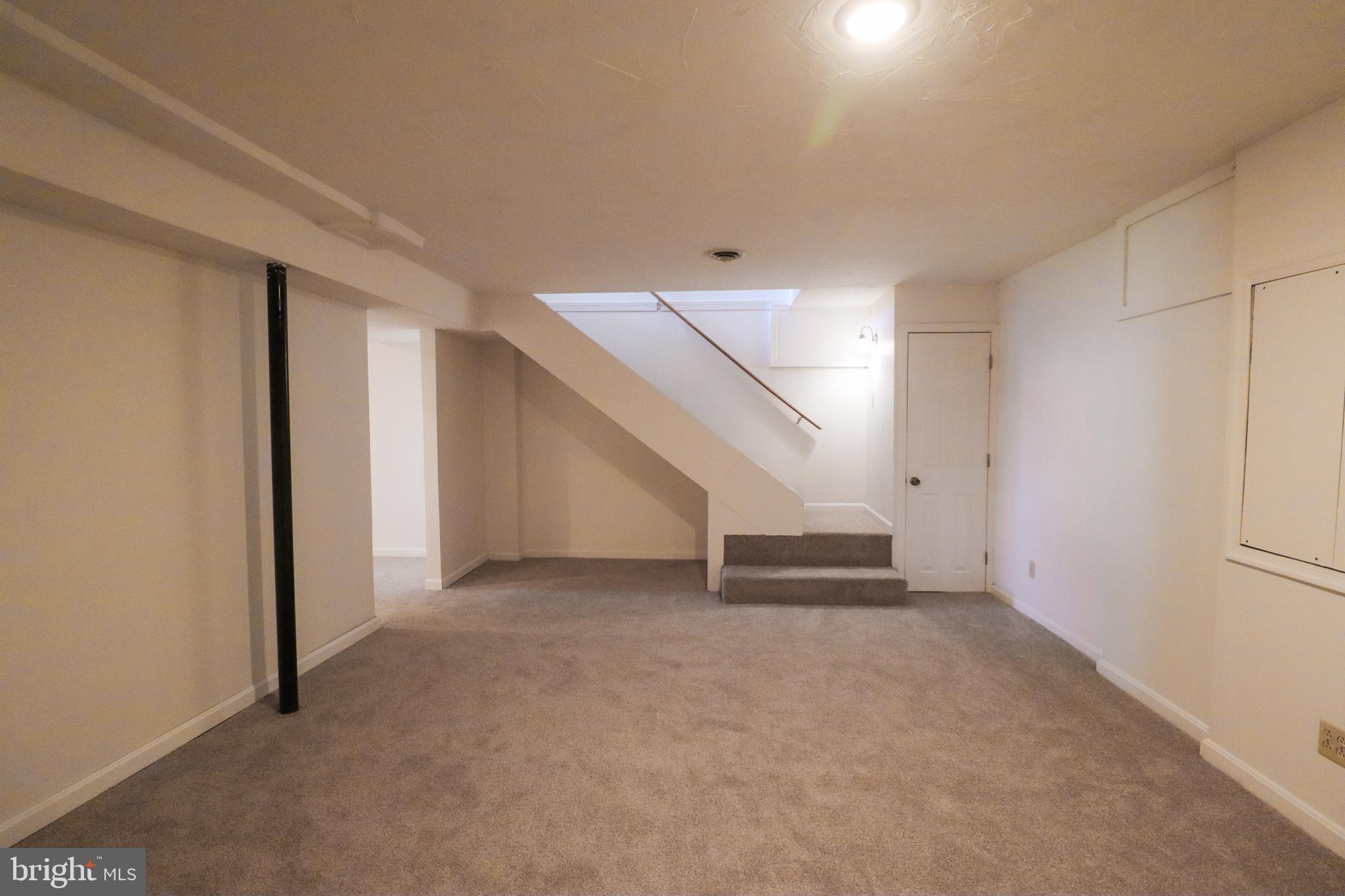 552 Locust Street Hanover, PA 17331 - Photo 24 of 31 Finished walkout basement