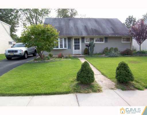 29 Brookville Road Edison, NJ 08817 - Photo 1 of 10 a view of a house with a yard and sitting area