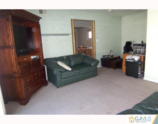 29 Brookville Road Edison, NJ 08817 - Photo 6 of 10 a living room with furniture