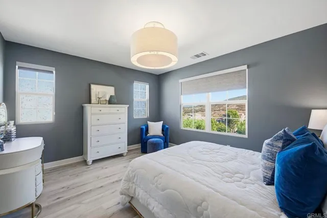 a bedroom with a bed and a closet