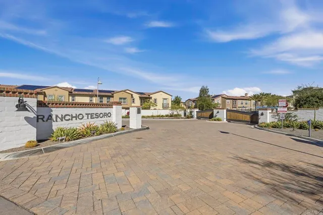 a view of a building with a street