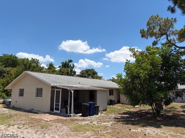 2175 Twin Brooks Road North Fort Myers, FL 33917 - Photo 17 of 27 a view of a house with a backyard