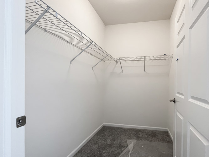 4 Ridge Court Bolingbrook, IL 60440 - Photo 8 of 16 a view of a room with racks on the wall