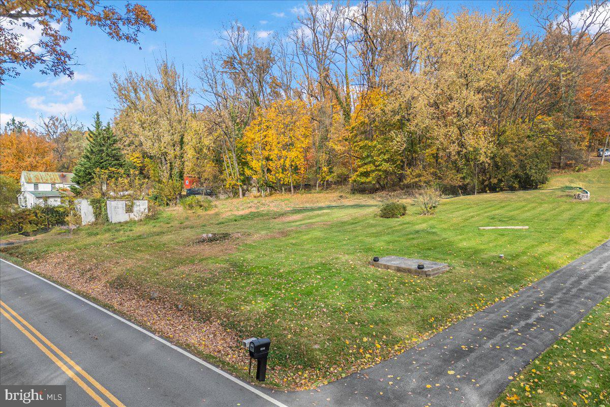 8245 Water Street Road Walkersville, MD 21793 - Photo 2 of 11 a view of a field with an trees