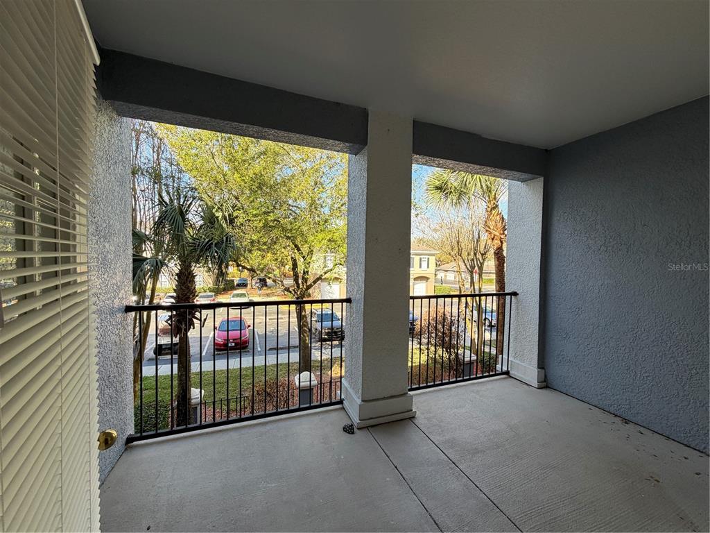 3561 Conroy Road, Unit 225 Orlando, FL 32839 - Photo 7 of 14 a view of a balcony with window