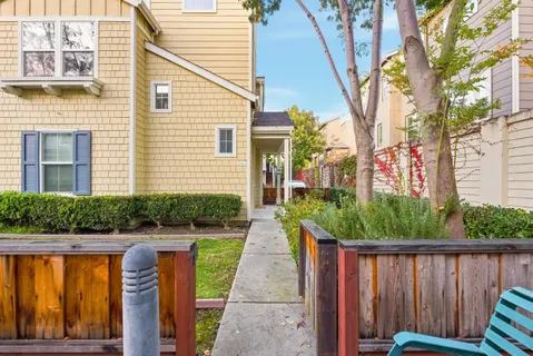 a house with swimming pool in front of it