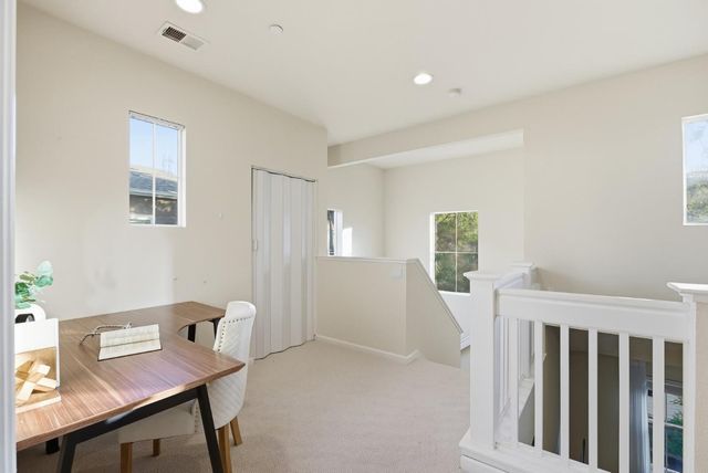 a workspace with furniture and window