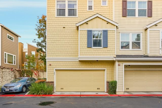 a front view of a multi story residential apartment building