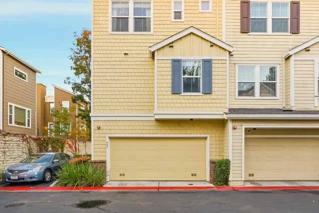 a front view of a multi story residential apartment building