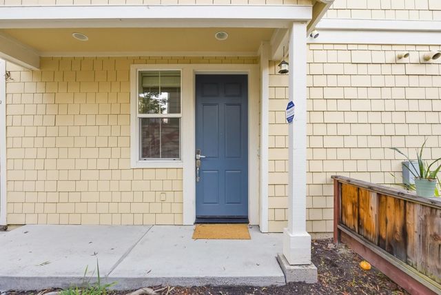a front view of a house with a garage