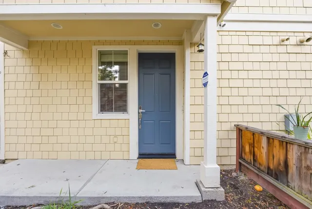 a front view of a house with a garage