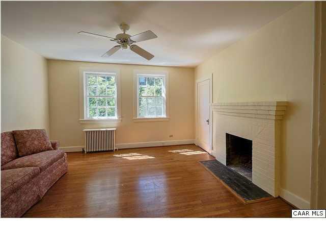 1810 Winston Road Charlottesville, VA 22903 - Photo 17 of 22 a living room with furniture and a fireplace
