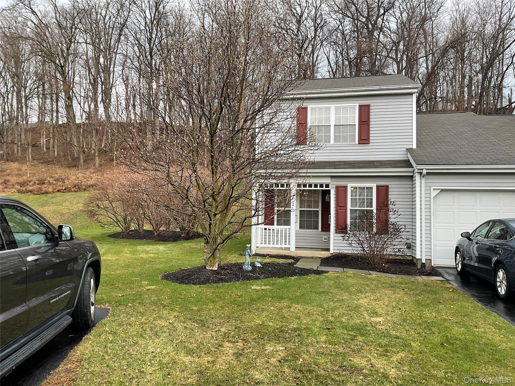 17 Tall Tree Lane Poughkeepsie, NY 12601 - Photo 1 of 31 a view of a house with a yard