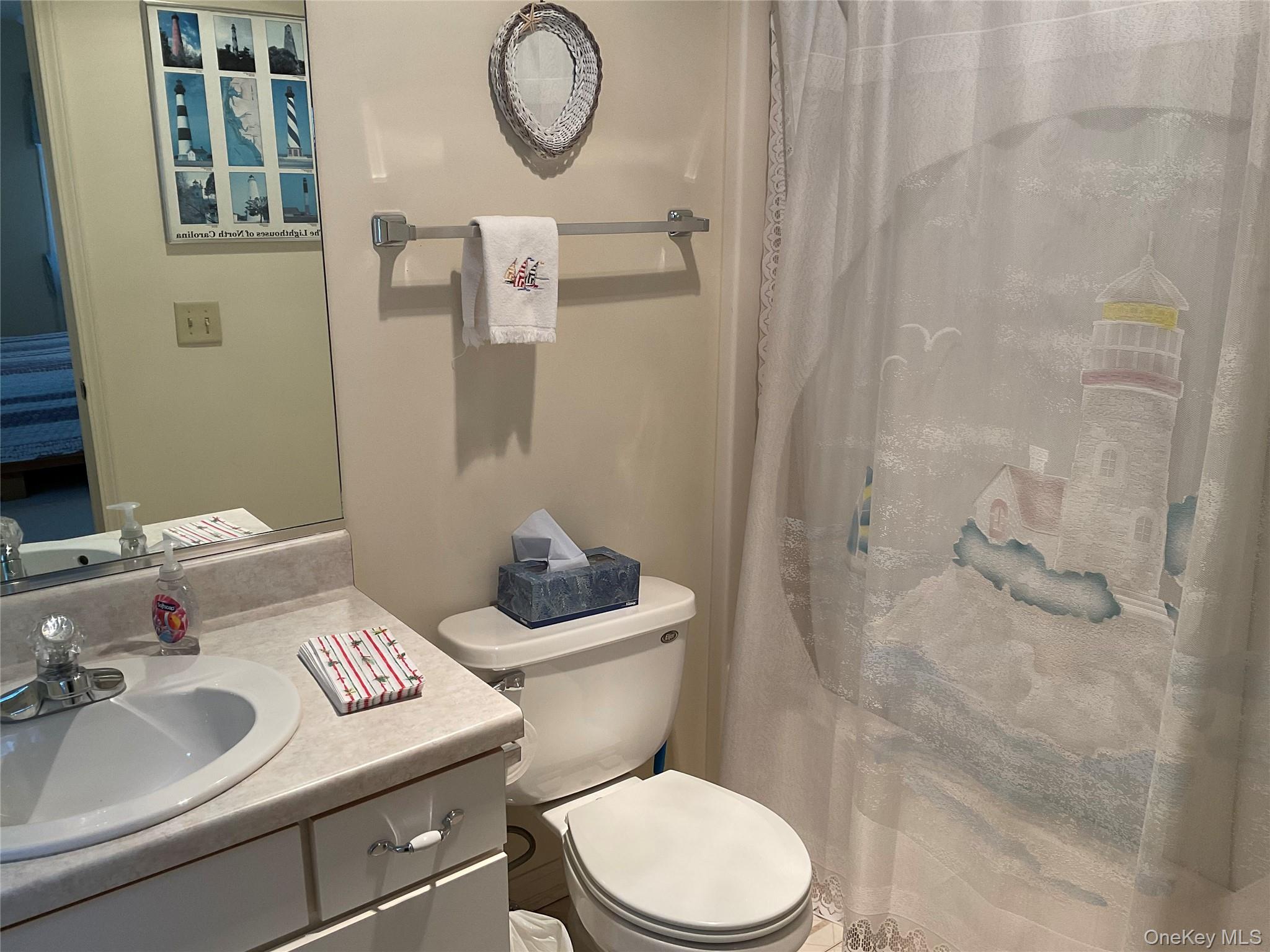 17 Tall Tree Lane Poughkeepsie, NY 12601 - Photo 22 of 31 a bathroom with a sink toilet and shower