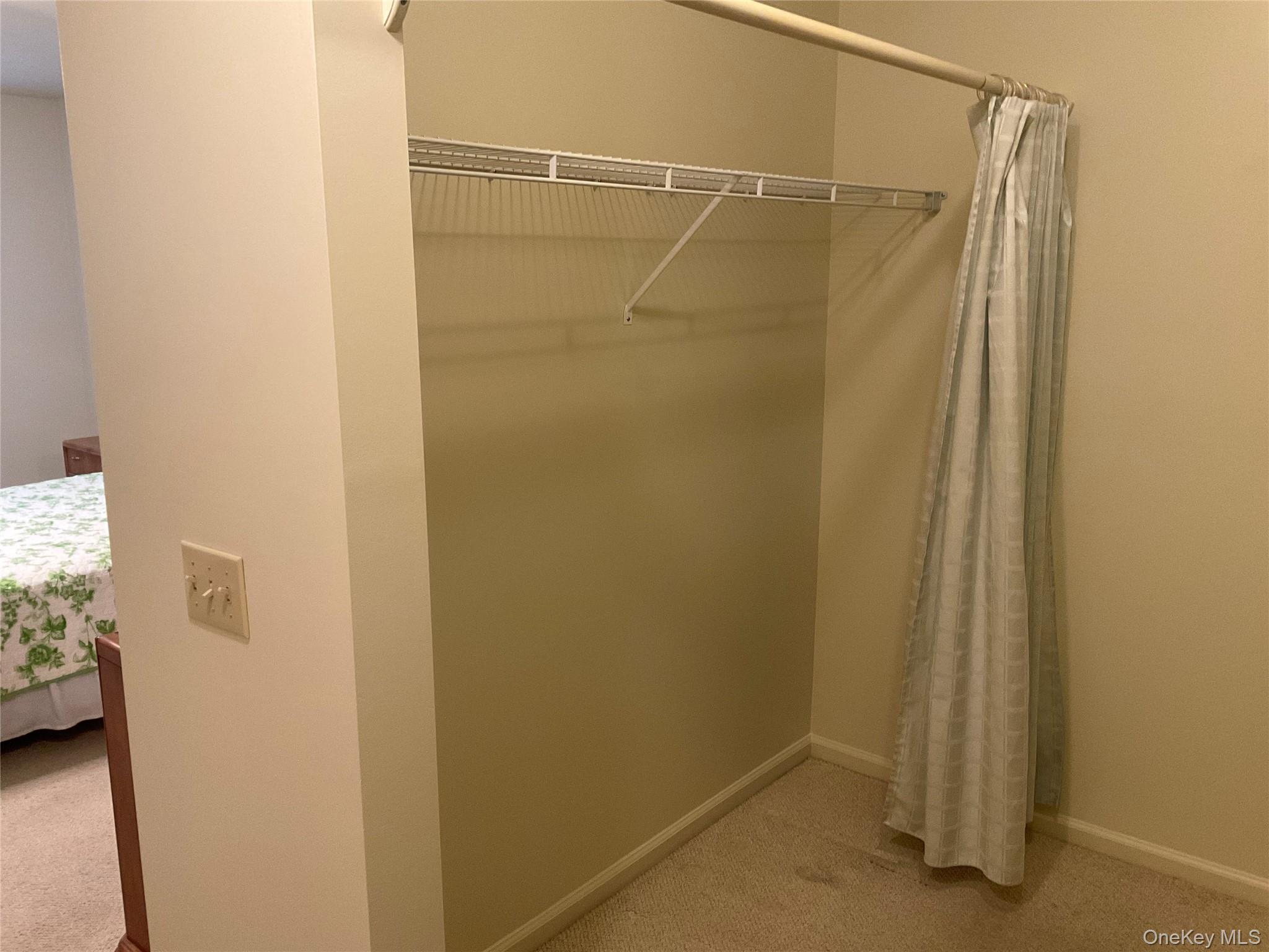 17 Tall Tree Lane Poughkeepsie, NY 12601 - Photo 26 of 31 a bathroom with a glass shower door
