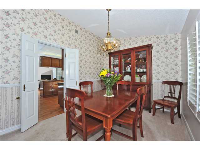 4809 Morning Canyon Road Oceanside, CA 92056 - Photo 8 of 25 Notice the moulding and plantation shutters!