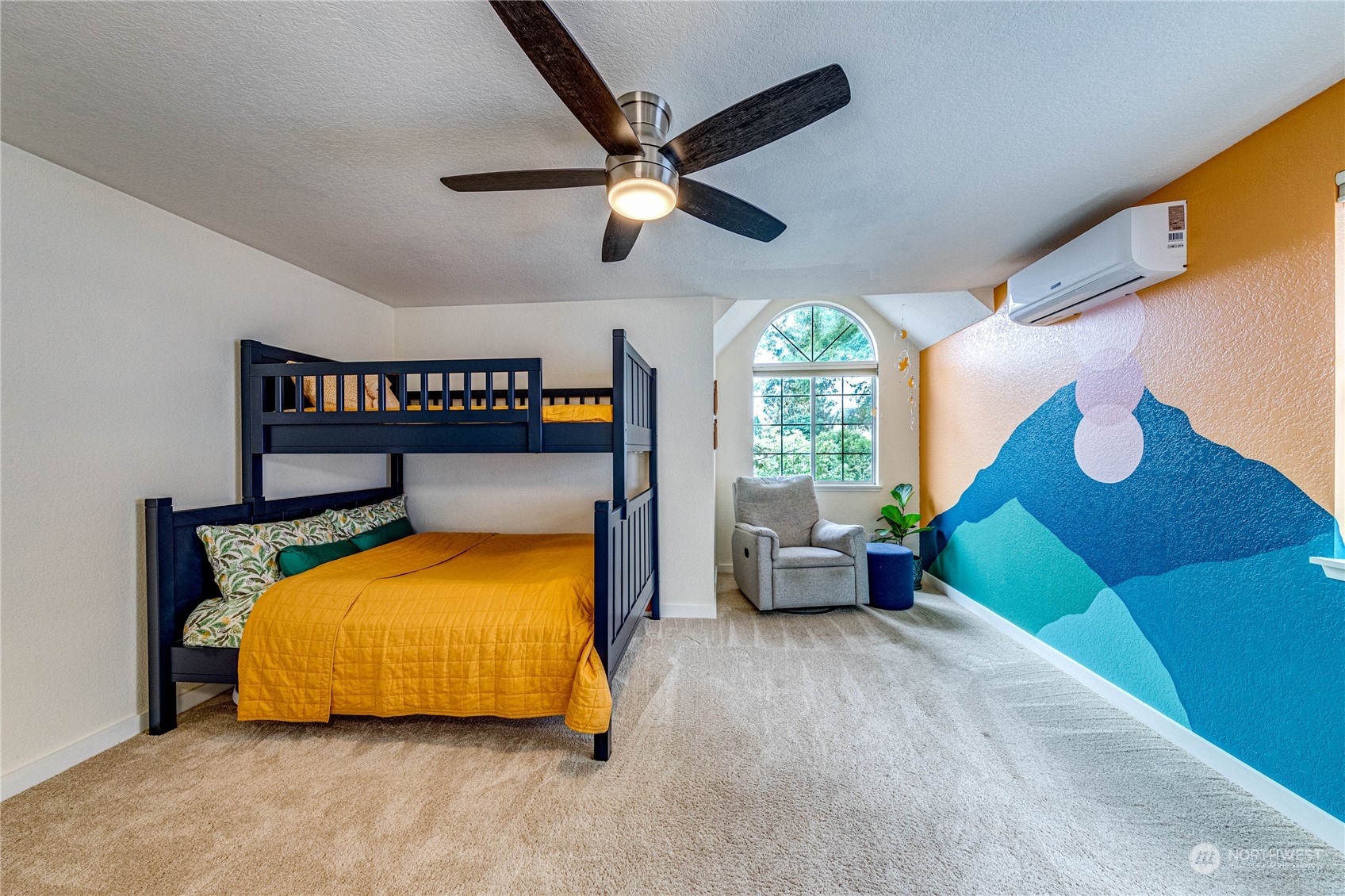 924 North 86th Street Seattle, WA 98103 - Photo 19 of 27 a bedroom with a bed and a large window