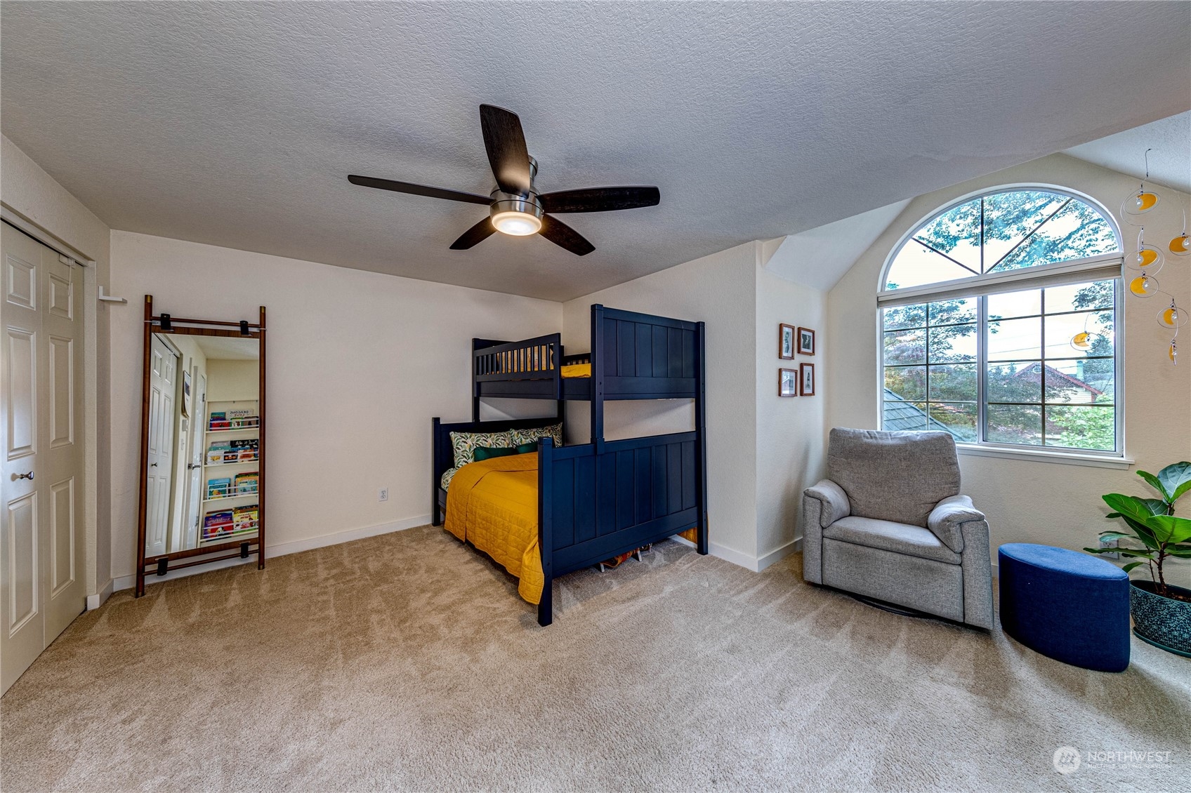 924 North 86th Street Seattle, WA 98103 - Photo 20 of 27 a living room with furniture and a large window
