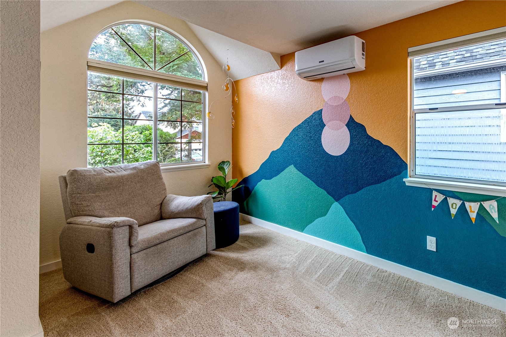 924 North 86th Street Seattle, WA 98103 - Photo 21 of 27 a living room with furniture and a large window