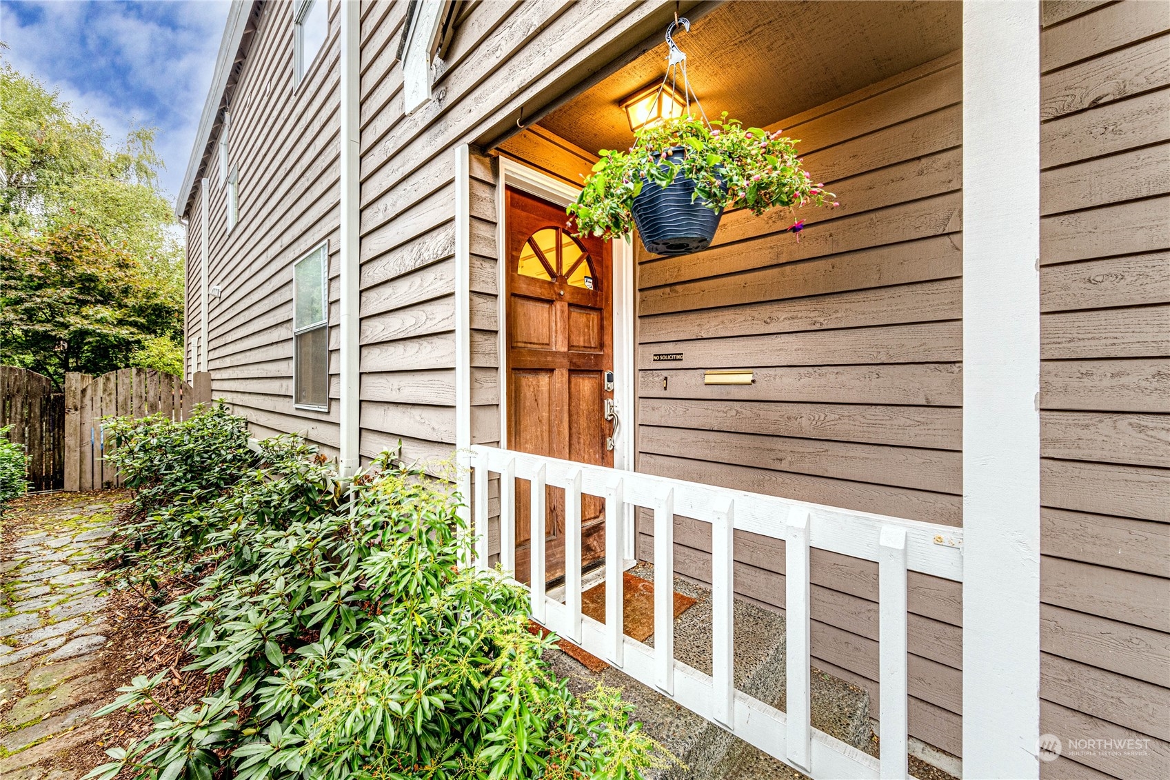 924 North 86th Street Seattle, WA 98103 - Photo 3 of 27 a view of a house with a flower plants