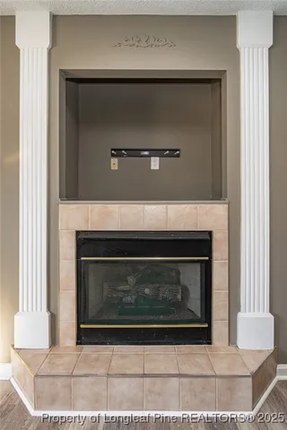 a stove top oven sitting inside of a kitchen
