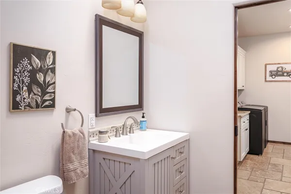 a bathroom with a sink and a toilet
