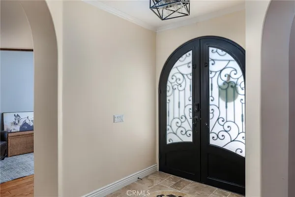 a view of front door with furniture