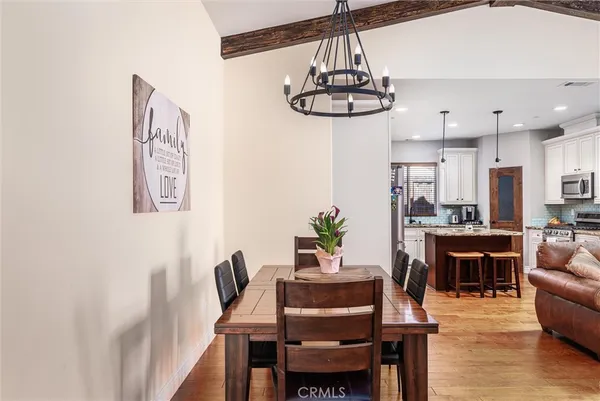a view of a dining room with furniture