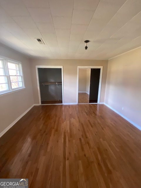 121 Sunset Drive Northeast Calhoun, GA 30701 - Photo 11 of 33 a view of empty room with wooden floor