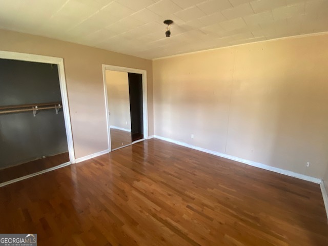 121 Sunset Drive Northeast Calhoun, GA 30701 - Photo 12 of 33 a view of empty room with wooden floor