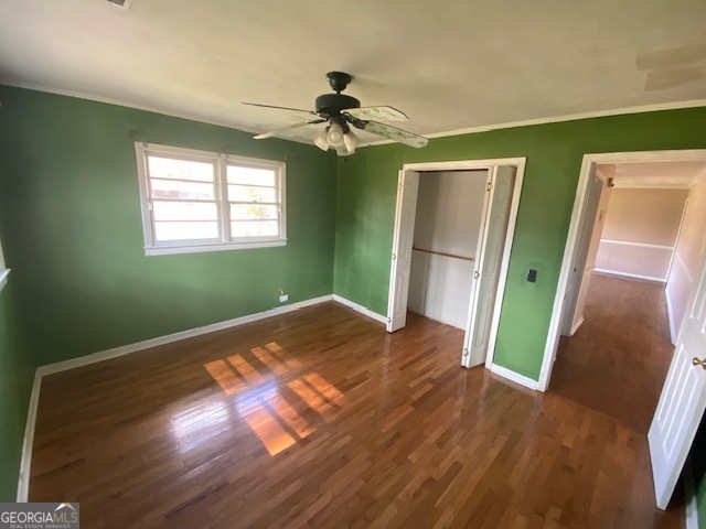 121 Sunset Drive Northeast Calhoun, GA 30701 - Photo 14 of 33 a view of empty room with wooden floor and fan