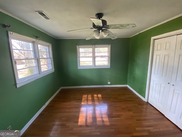121 Sunset Drive Northeast Calhoun, GA 30701 - Photo 15 of 33 a view of an empty room window and wooden floor