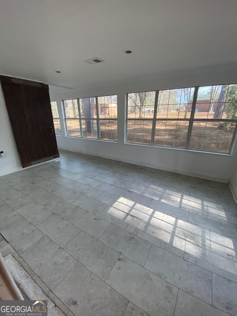 121 Sunset Drive Northeast Calhoun, GA 30701 - Photo 20 of 33 a view of an empty room with a window