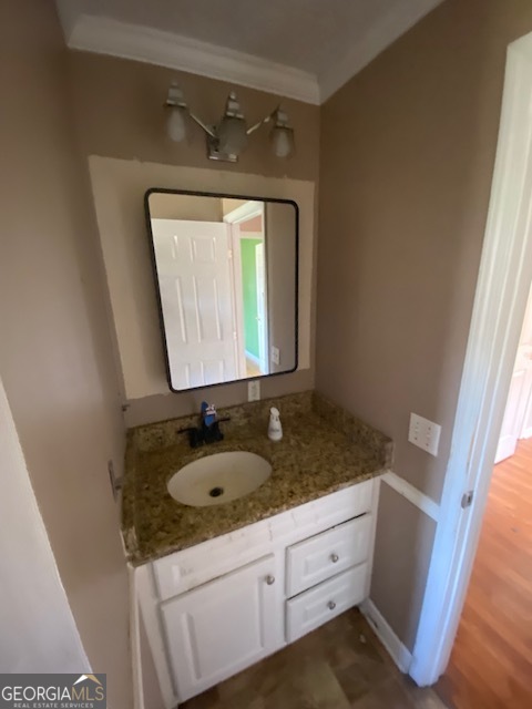121 Sunset Drive Northeast Calhoun, GA 30701 - Photo 27 of 33 a bathroom with a granite countertop sink toilet and mirror