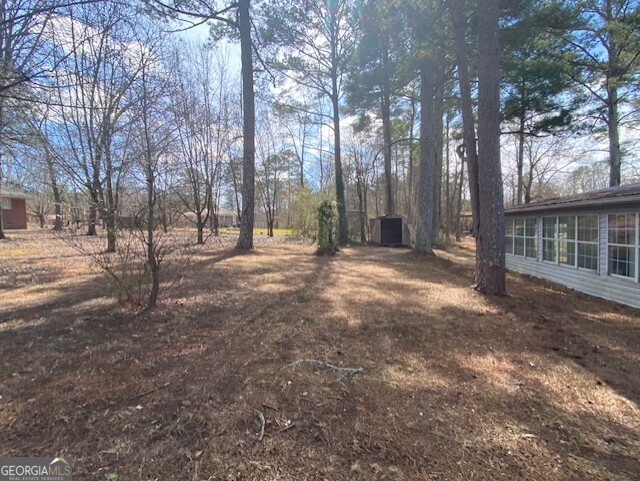 121 Sunset Drive Northeast Calhoun, GA 30701 - Photo 28 of 33 a view of outdoor space with trees